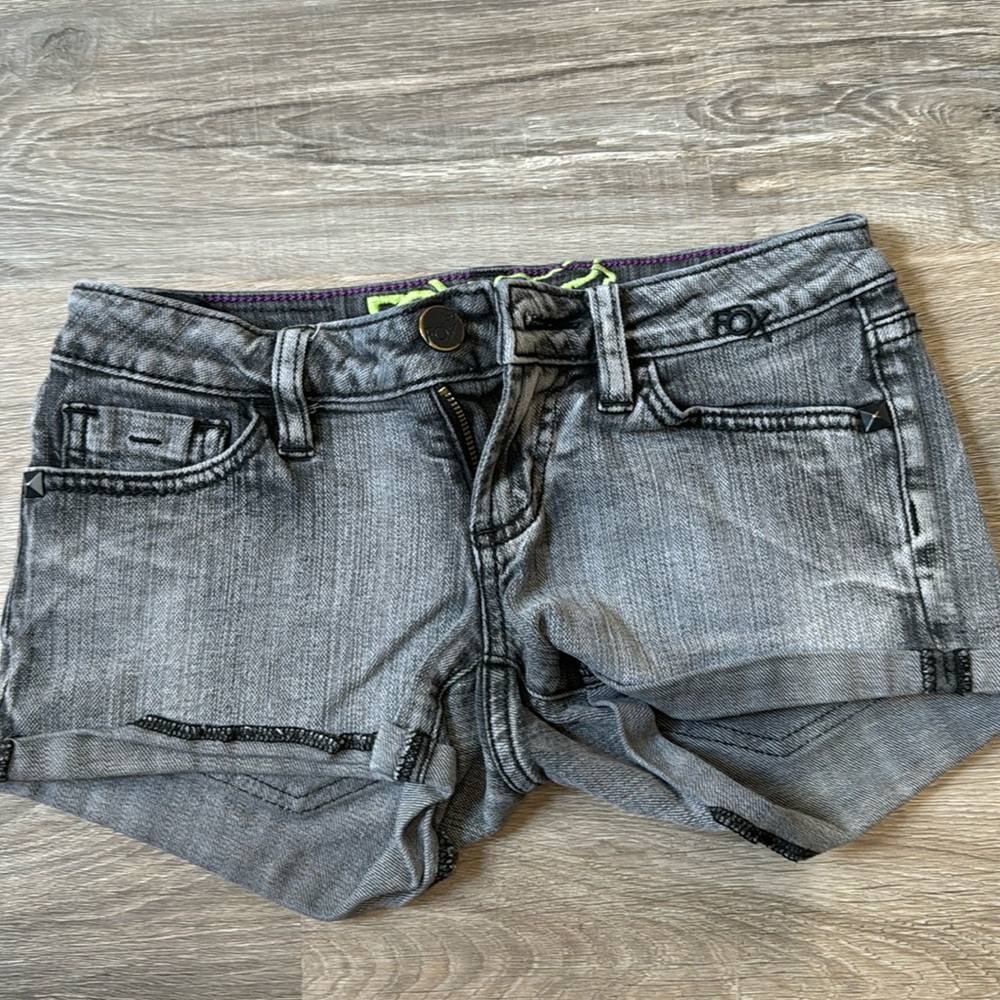 Fox black jean shorts size 0 four pockets two in form and two in back.